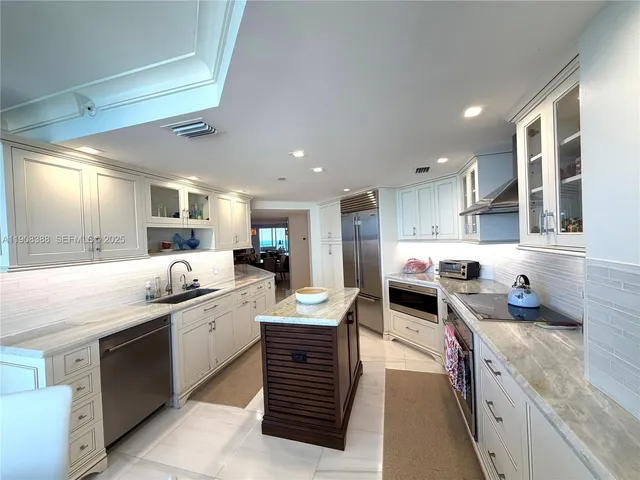 a room with a wooden floor and a sink