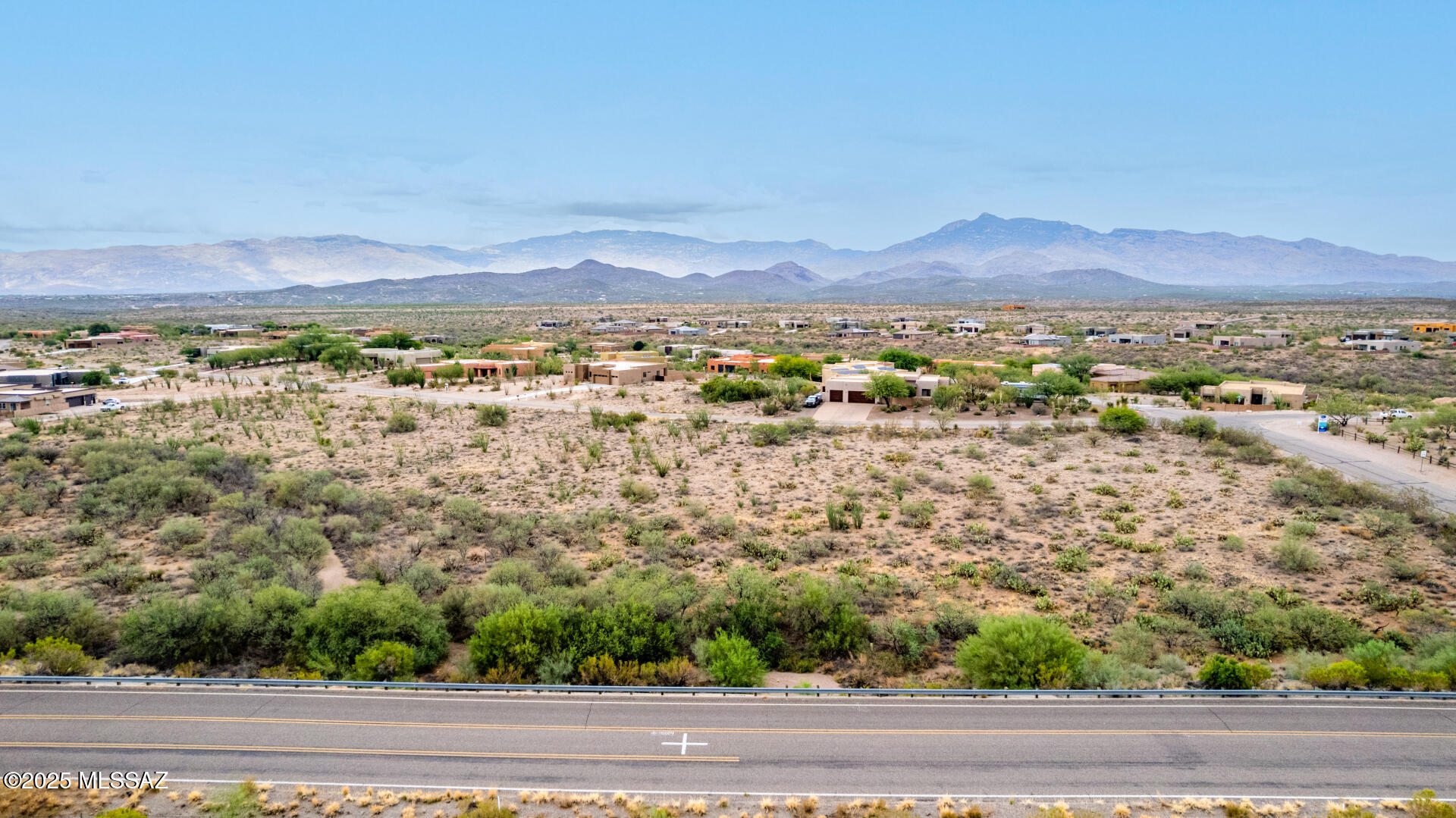 14470 East Sands Ranch Road, Unit 304 Vail, AZ 85641 - Photo 6 of 8 a view of a city with mountain