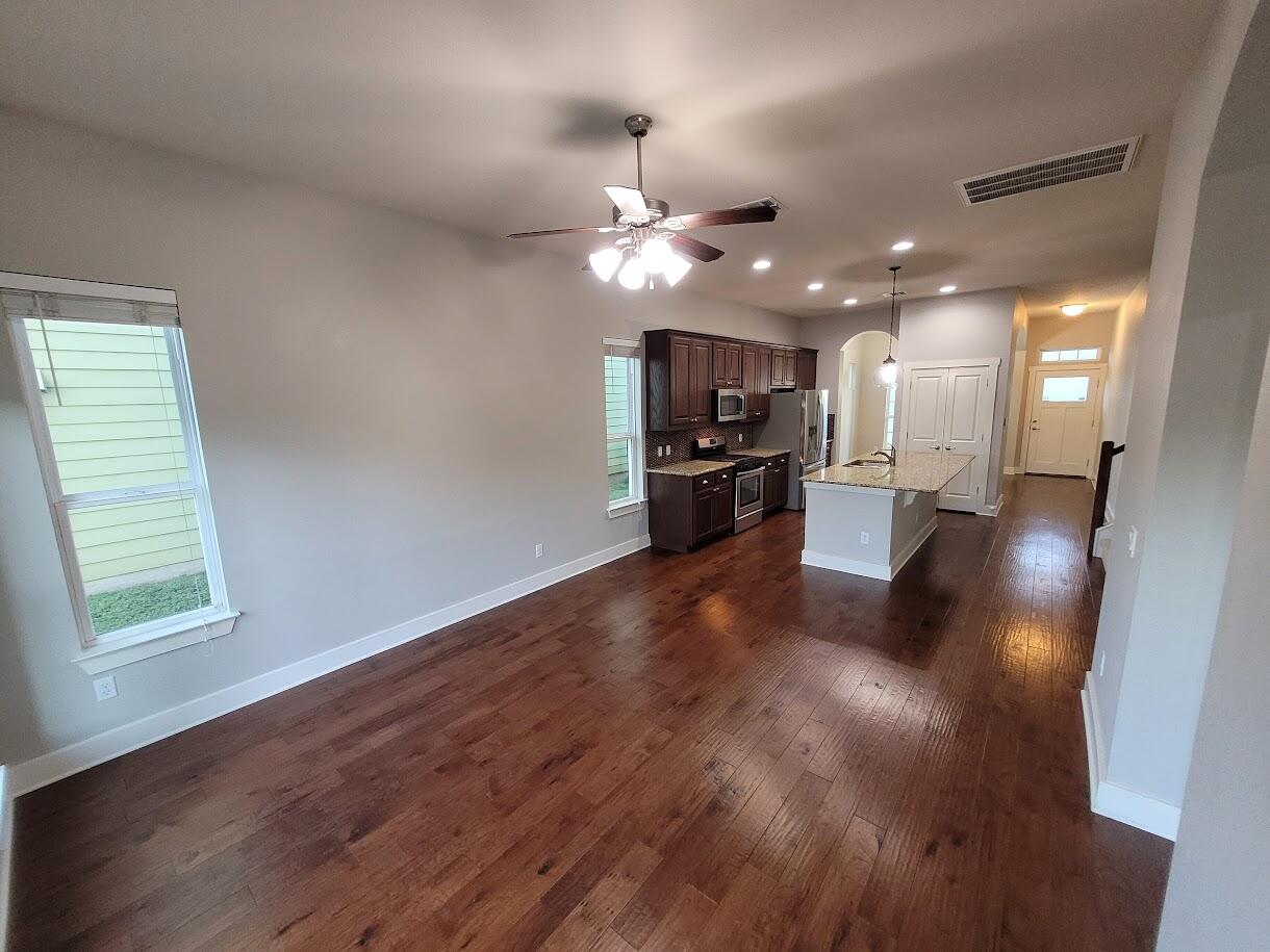 2404 Vintage Stave Road, Unit 102 Austin, TX 78748 - Photo 11 of 39 a view of a electric appliances in kitchen and an empty room