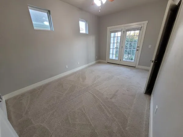 an empty room with windows