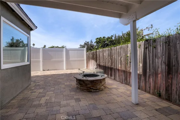 a living room with a couch and a garden