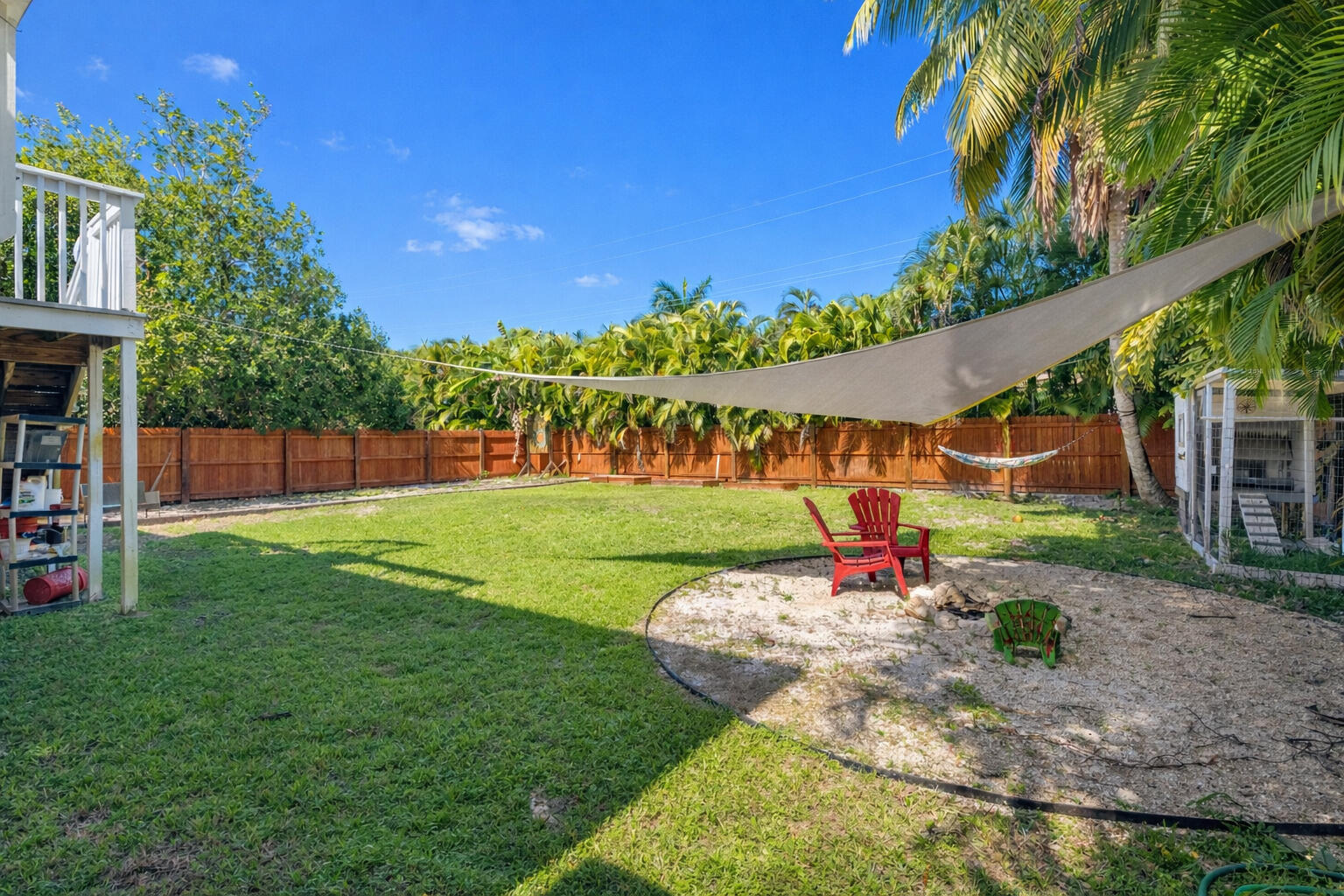 27147 Dolphin Road Summerland Key, FL 33042 - Photo 16 of 19 Tropical Backyard escape with seating ar