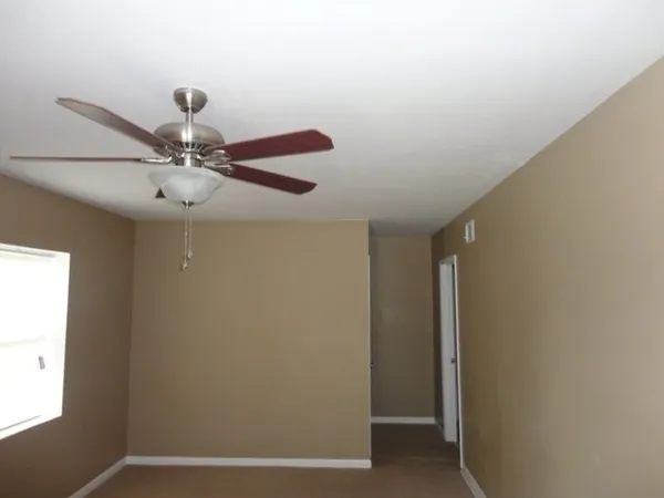 a view of a room with a fan