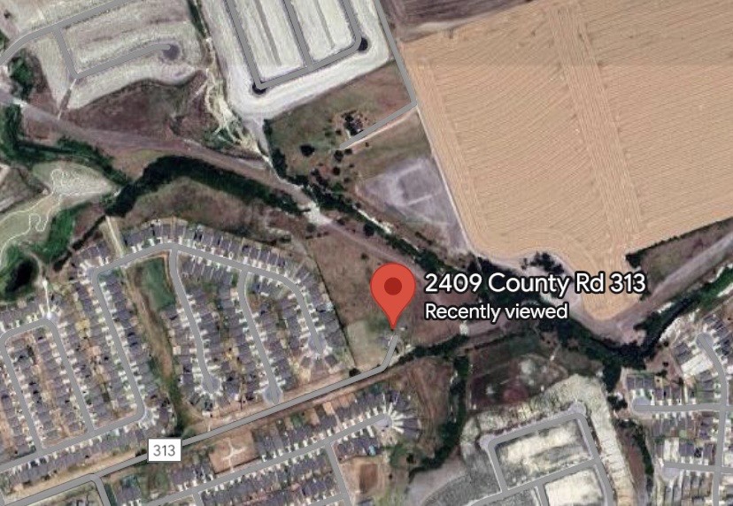 2409 County Road 313 Jarrell, TX 76537 - Photo 2 of 2 a view of a street sign