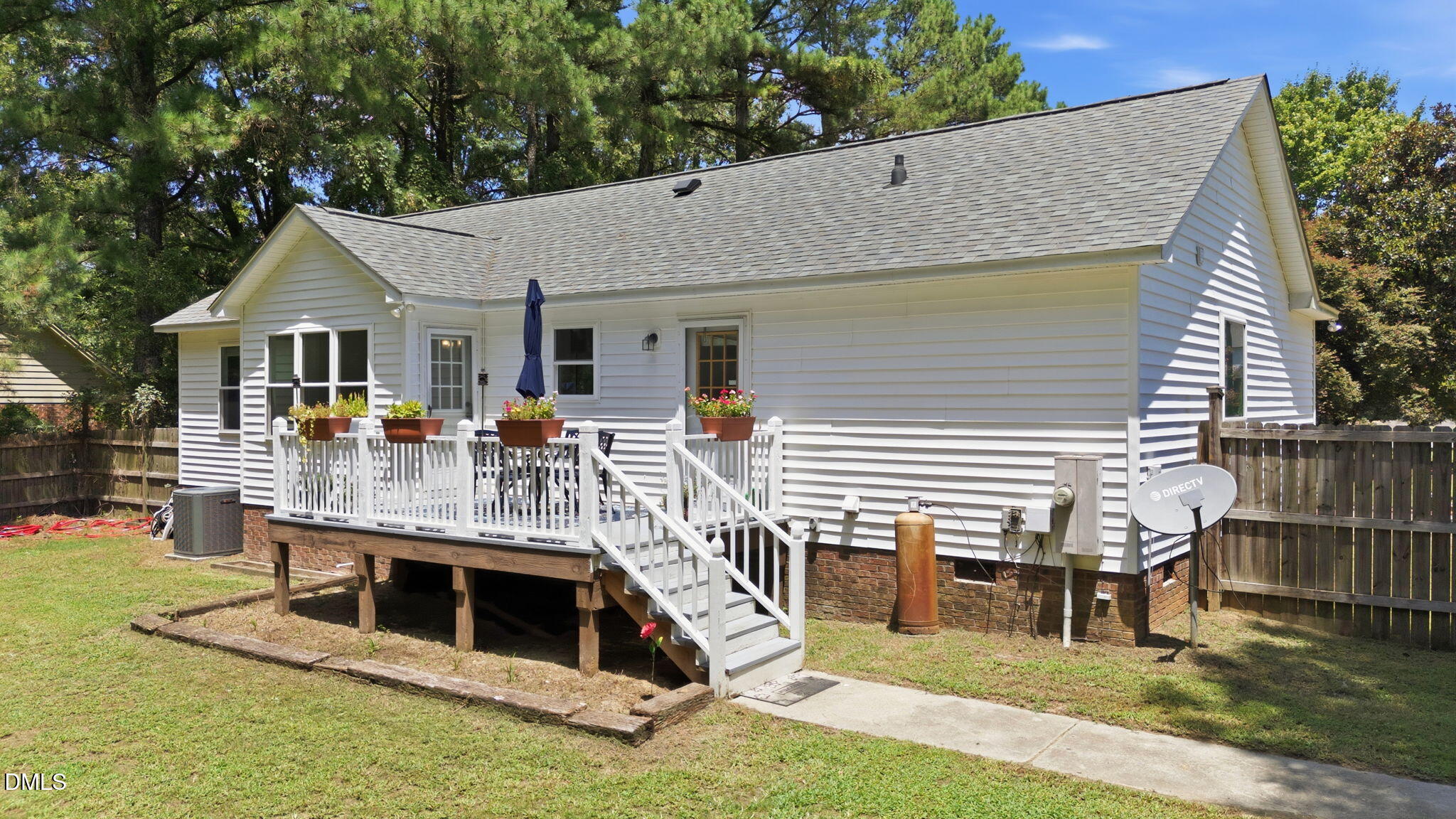5419 Cleveland Road Clayton, NC 27520 - Photo 29 of 39 Rear exterior and elevated deck