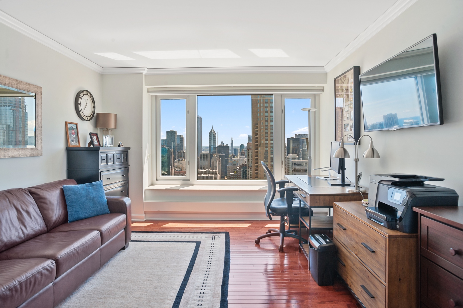 132 East Delaware Place, Unit 4801 Chicago, IL 60611 - Photo 11 of 20 a living room with furniture and a large window