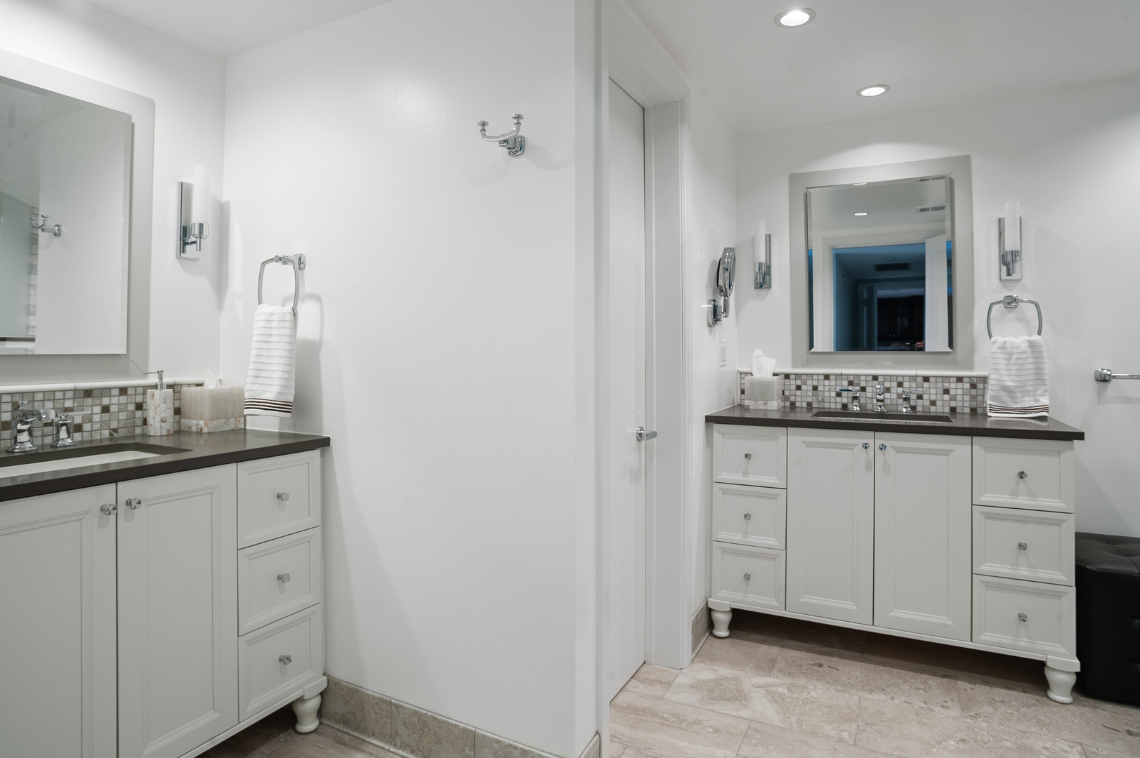 132 East Delaware Place, Unit 4801 Chicago, IL 60611 - Photo 17 of 20 a bathroom with a granite countertop sink and a mirror