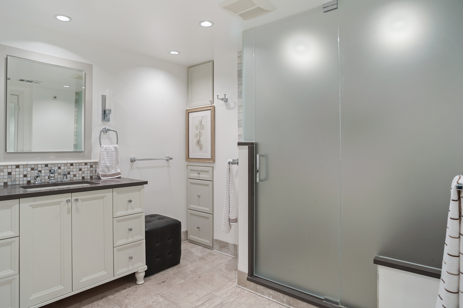 132 East Delaware Place, Unit 4801 Chicago, IL 60611 - Photo 18 of 20 a bathroom with a granite countertop sink and a mirror