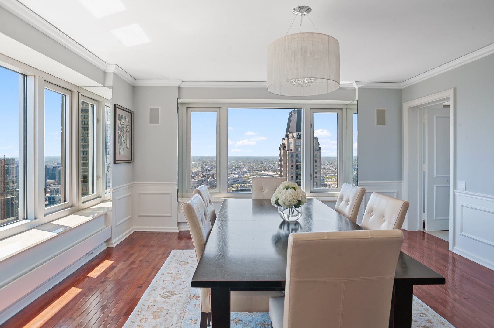 132 East Delaware Place, Unit 4801 Chicago, IL 60611 - Photo 6 of 20 a living room with furniture and a large window