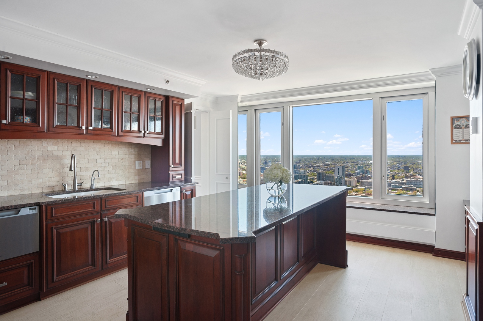 132 East Delaware Place, Unit 4801 Chicago, IL 60611 - Photo 8 of 20 a very nice looking kitchen with a large window