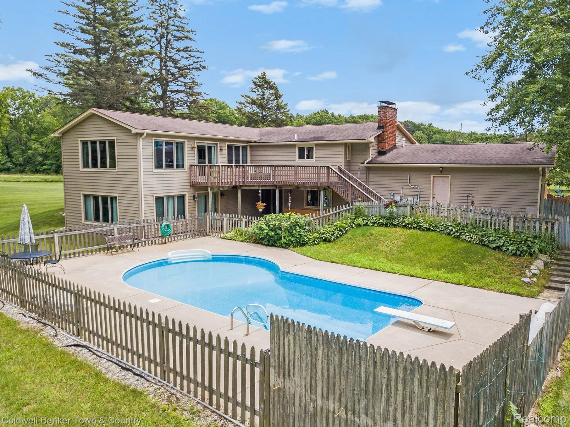 7684 Pinckney Road Pinckney, MI 48169 - Photo 2 of 23 Beautiful Pool For HOT Summer Days