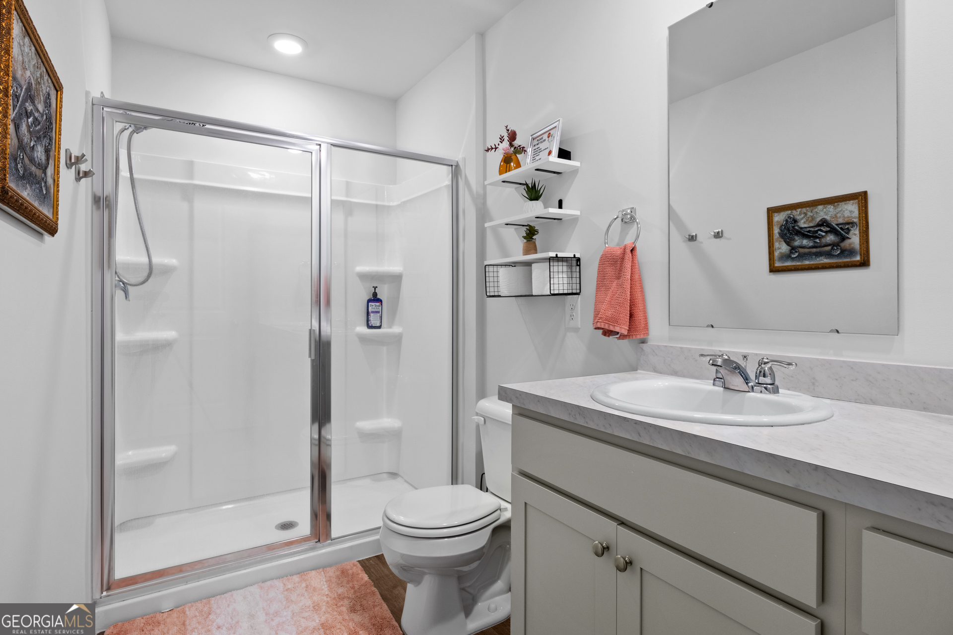 184 Coneflower Road Bloomingdale, GA 31302 - Photo 11 of 22 a bathroom with a sink toilet and shower