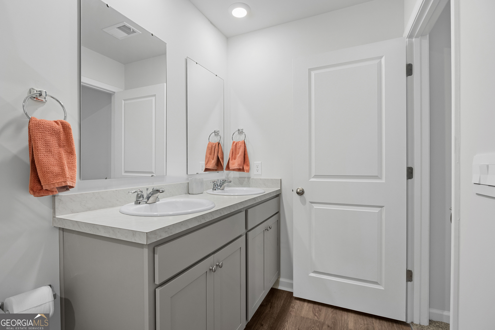 184 Coneflower Road Bloomingdale, GA 31302 - Photo 12 of 22 a bathroom with a sink and a mirror