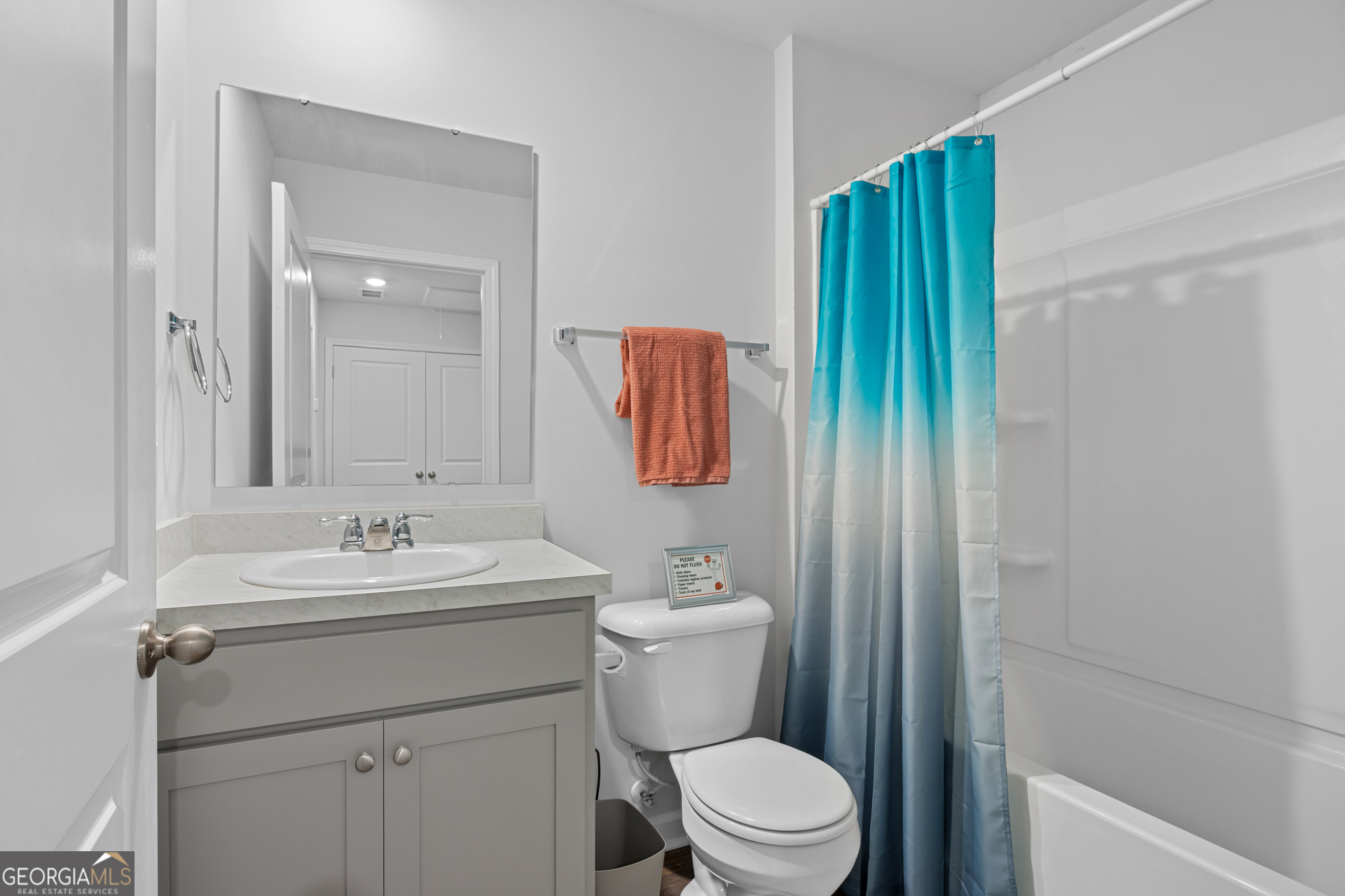184 Coneflower Road Bloomingdale, GA 31302 - Photo 13 of 22 a bathroom with a sink a toilet and shower
