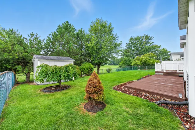 a view of a backyard with a garden