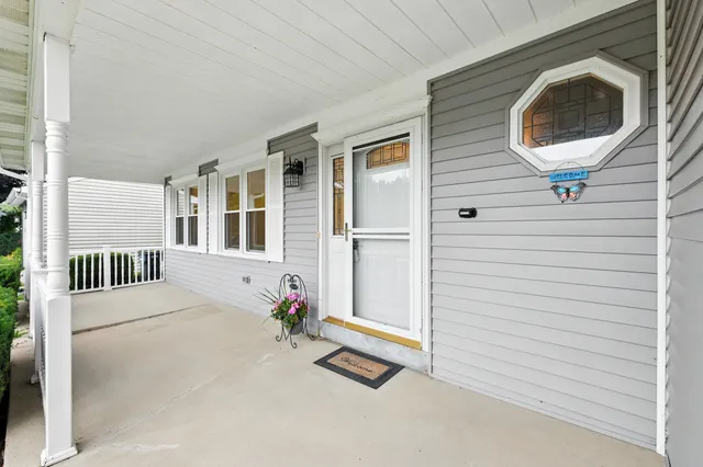 a view of a house with a porch