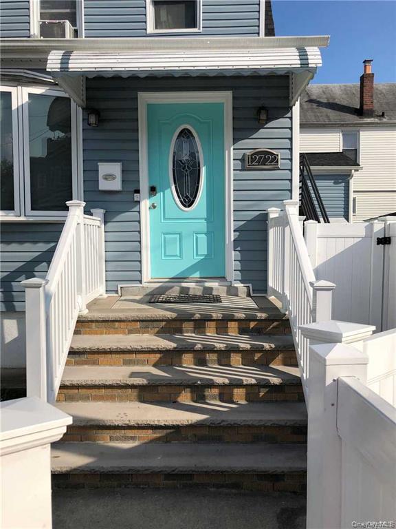 127-22 Hawtree Creek Road Queens, NY 11420 - Photo 1 of 12 a view of entryway with a front door
