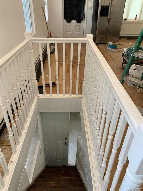 127-22 Hawtree Creek Road Queens, NY 11420 - Photo 3 of 12 a view of an entryway with staircase