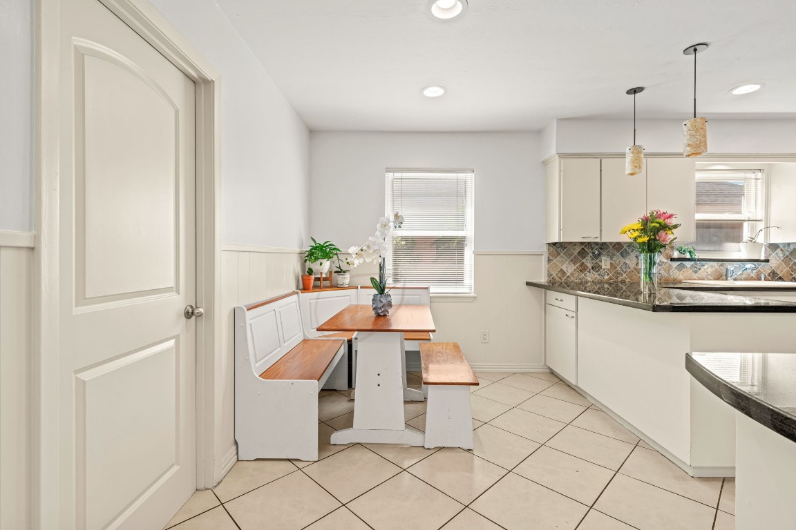 5827 Rutherglenn Drive Houston, TX 77096 - Photo 12 of 30 a kitchen with a sink cabinets and window