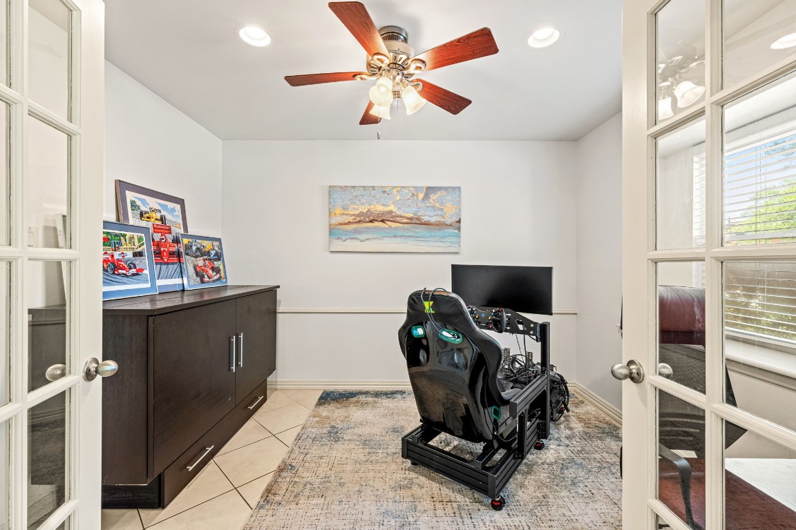 5827 Rutherglenn Drive Houston, TX 77096 - Photo 5 of 30 a view of workspace with furniture and window