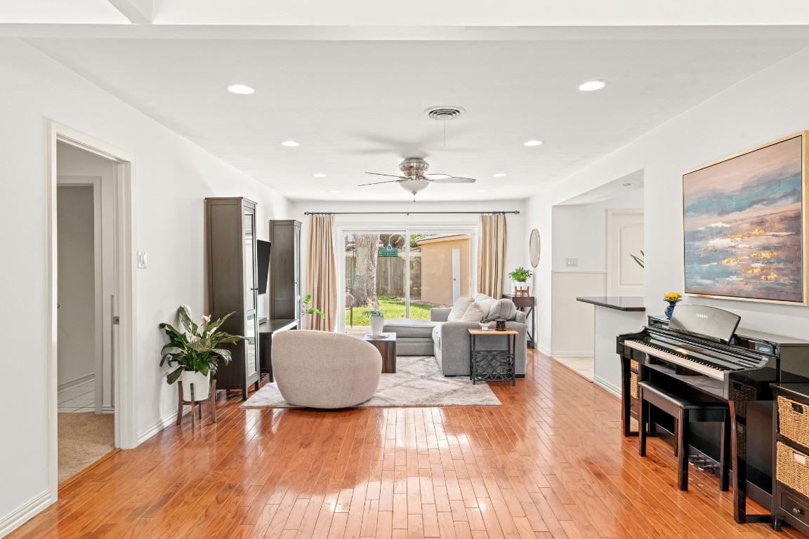 5827 Rutherglenn Drive Houston, TX 77096 - Photo 8 of 30 a living room with furniture and a large window