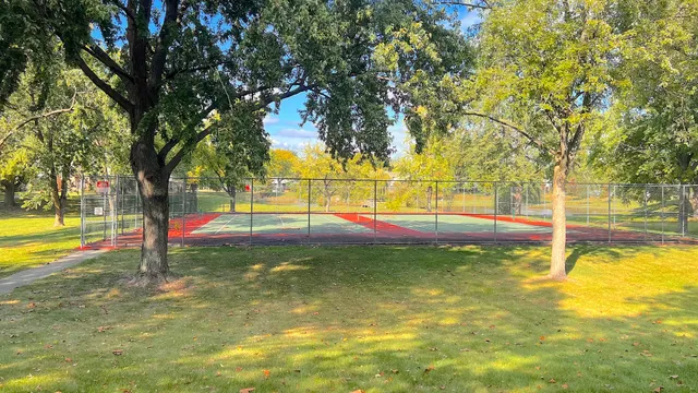 a view of a swimming pool with an outdoor space and sitting area