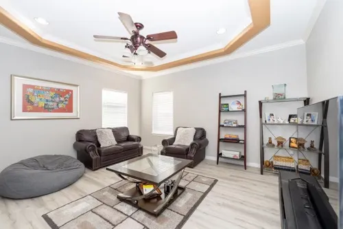 a view of dirt road with a building in the background