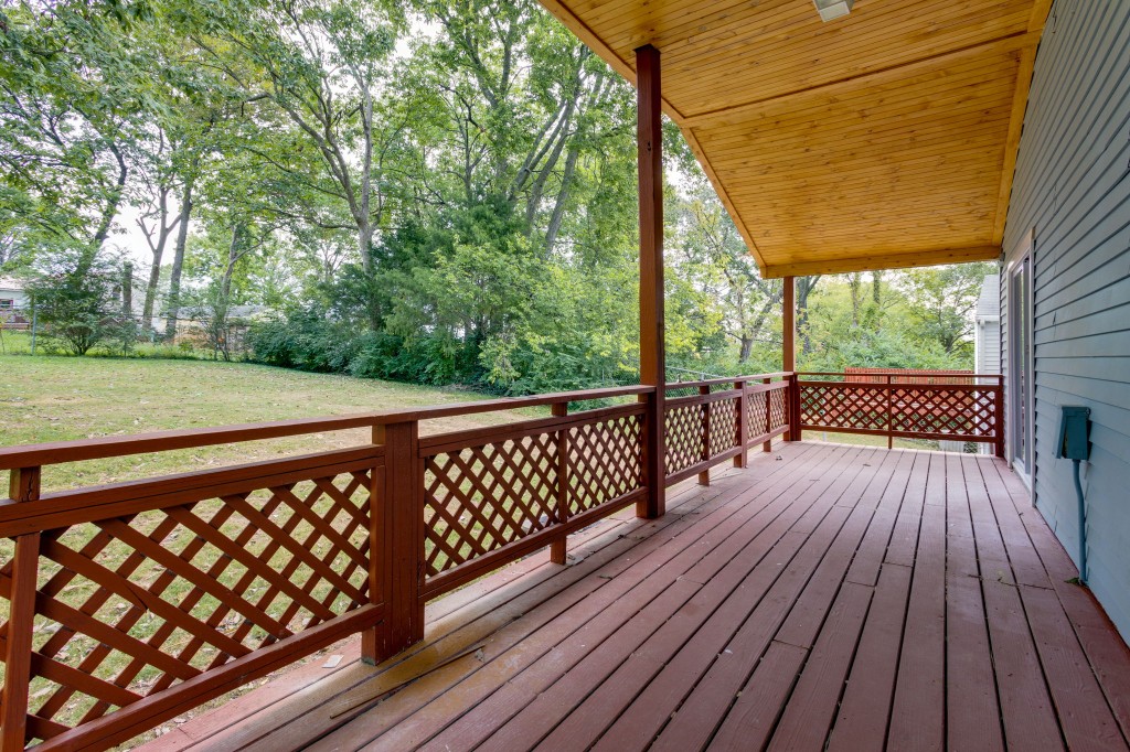 245 Warrior Road Madison, TN 37115 - Photo 20 of 24 a view of wooden deck with a yard