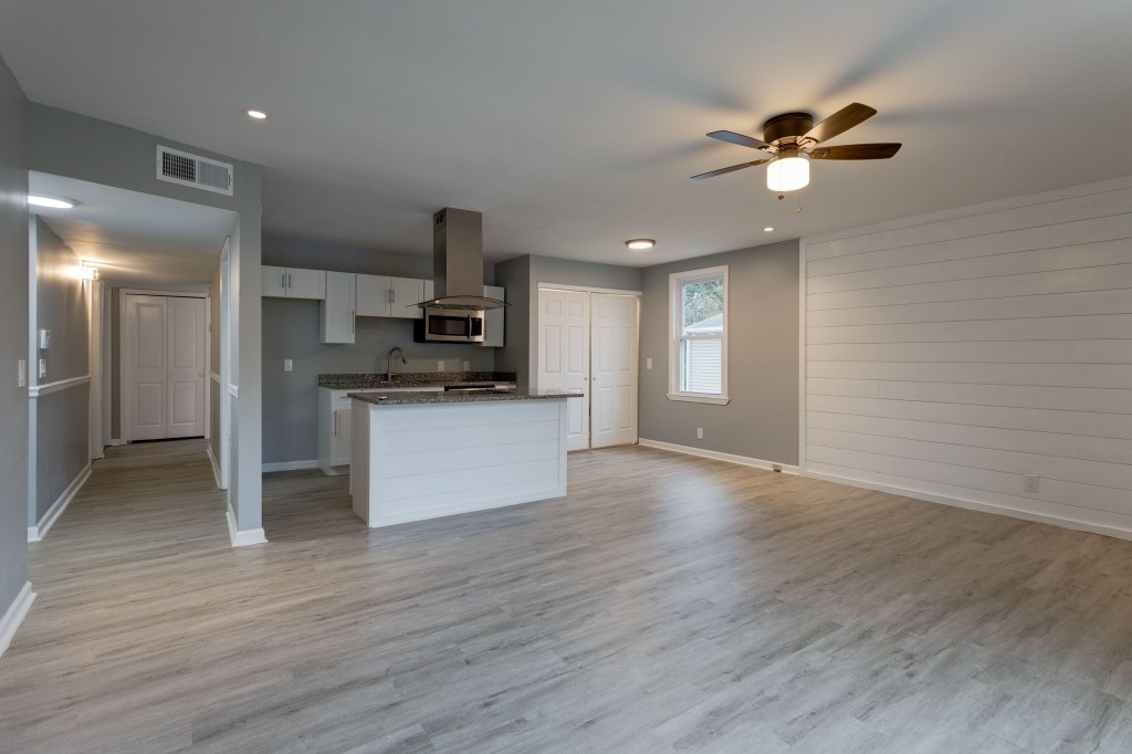 245 Warrior Road Madison, TN 37115 - Photo 8 of 24 a view of a kitchen with a sink and a window