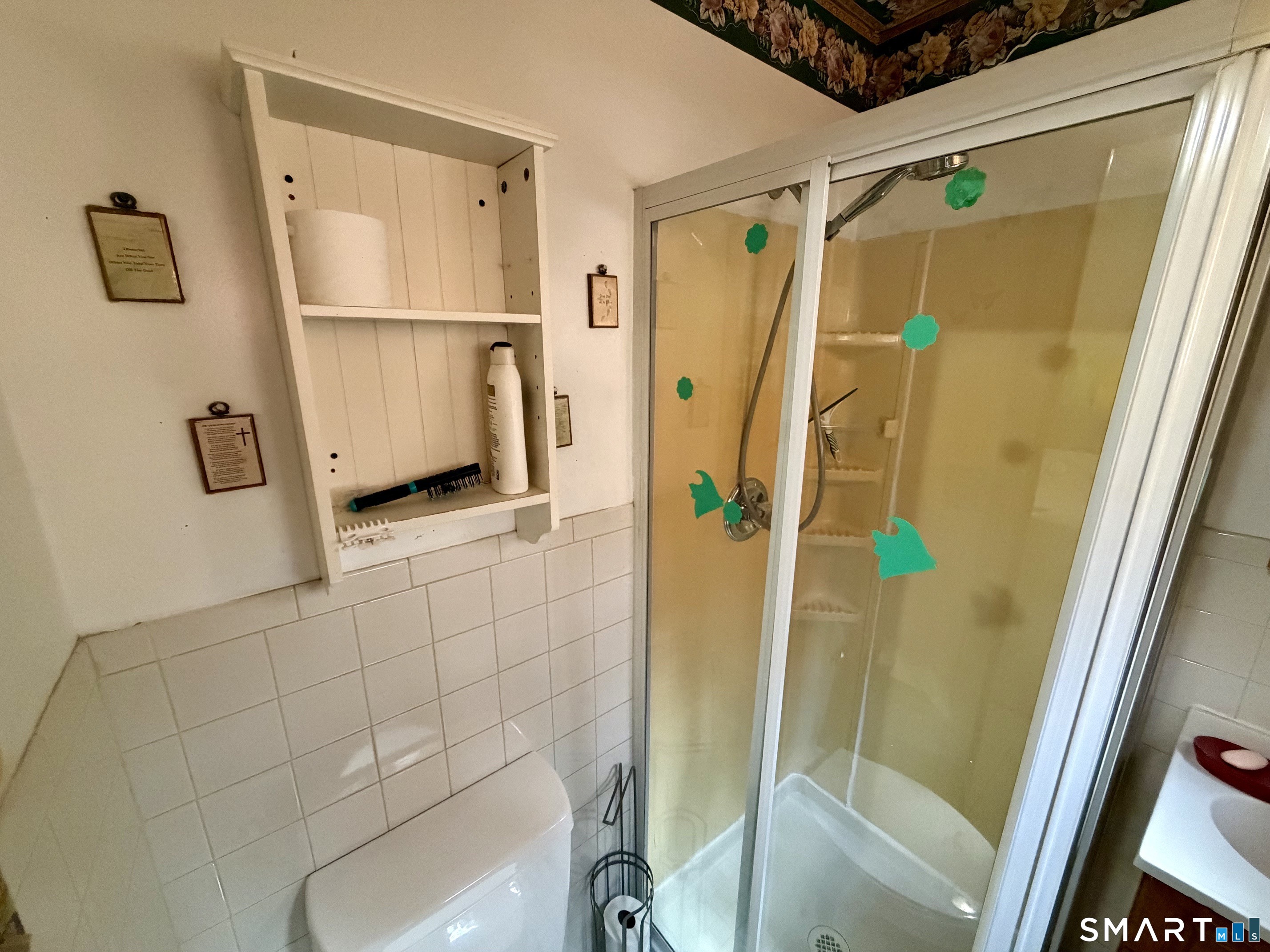 111 Waterman Street Bridgeport, CT 06607 - Photo 8 of 14 a bathroom with a shower and a sink