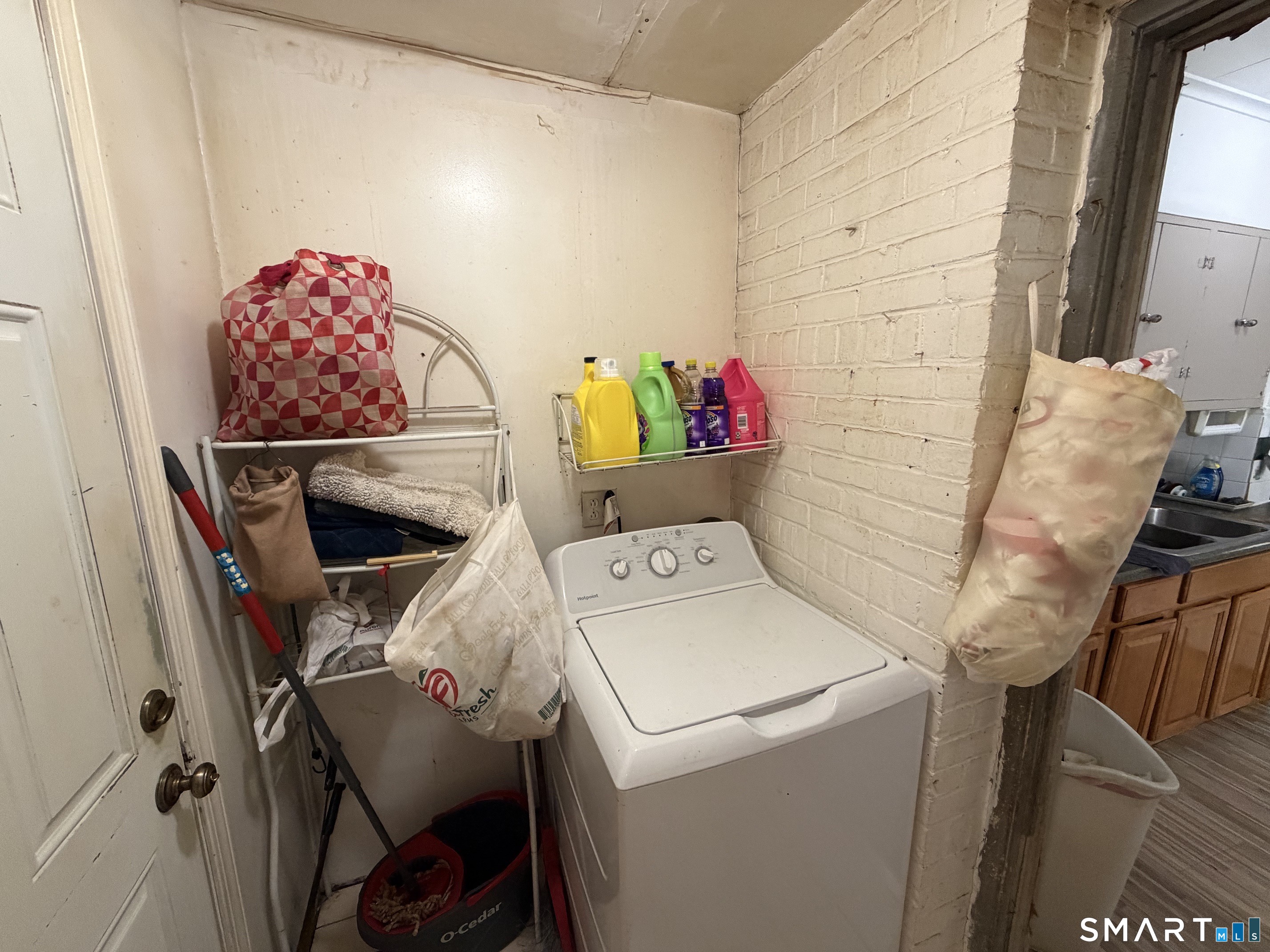 111 Waterman Street Bridgeport, CT 06607 - Photo 9 of 14 a utility room with dryer and washer