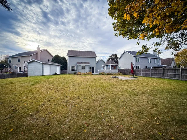 a view of a house with a big yard