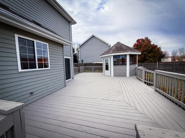a view of a house with a roof deck