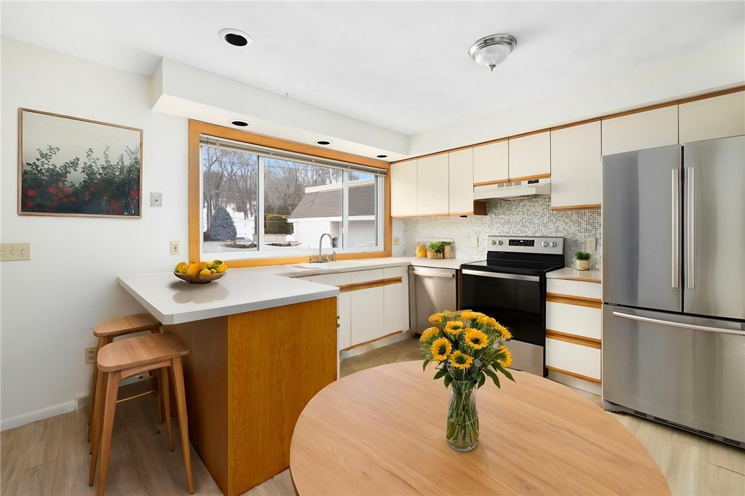 4158 Post Road, Unit 9 Warwick, RI 02818 - Photo 14 of 36 eat in kitchen enhanced staged