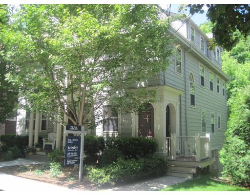 47 Clark Road, Unit 1 Brookline, MA 02445 - Photo 1 of 1 a front view of a house with garden