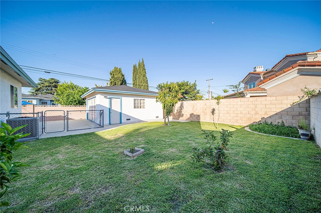 12216 Old River School Road Downey, CA 90242 - Photo 29 of 36 a view of a backyard with plants and a garden