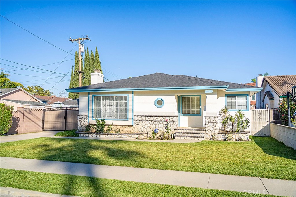 12216 Old River School Road Downey, CA 90242 - Photo 36 of 36 a front view of house with yard