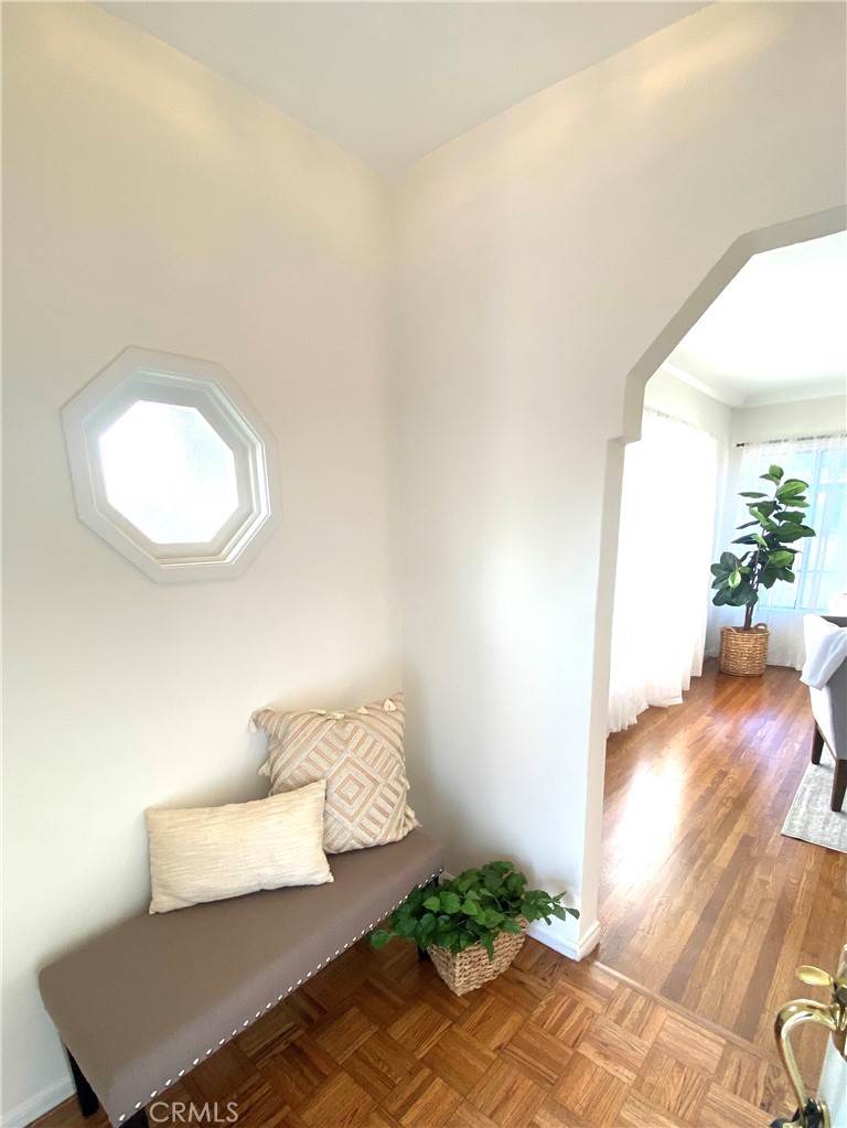12216 Old River School Road Downey, CA 90242 - Photo 4 of 36 a living room with furniture and a potted plant