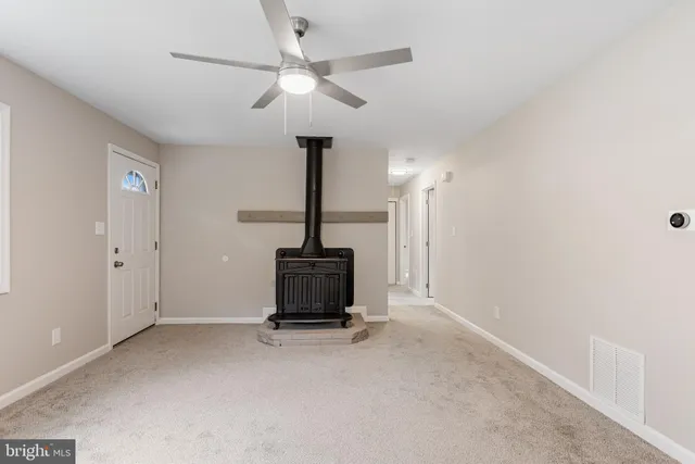 a view of a room with a flat screen tv