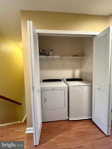 a utility room with washer and dryer