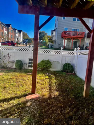 a view of a backyard with plants