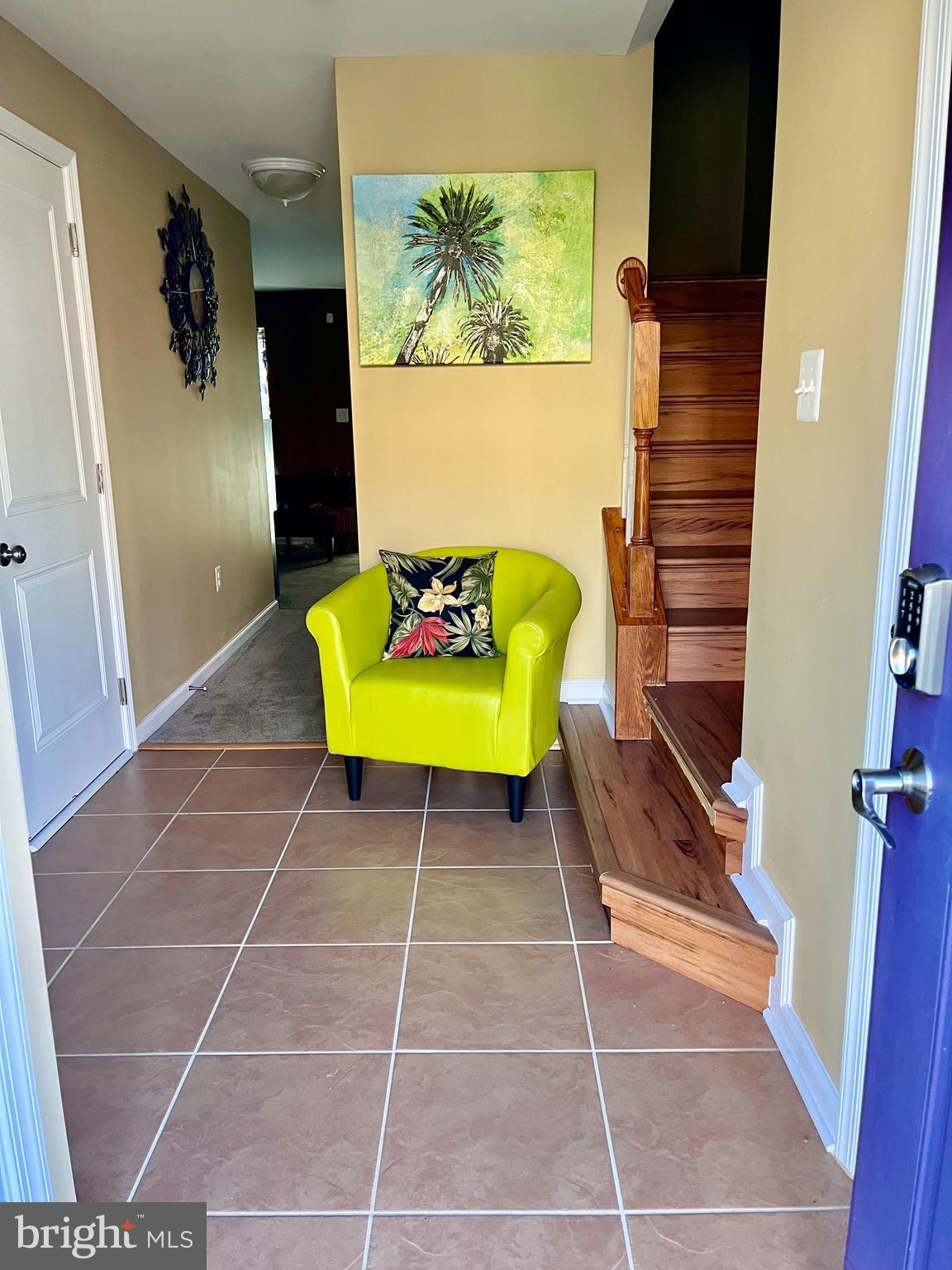 312 Spring Park Lane, Unit 59 Fredericksburg, VA 22405 - Photo 3 of 20 a living room with a rug and a painting on the wall
