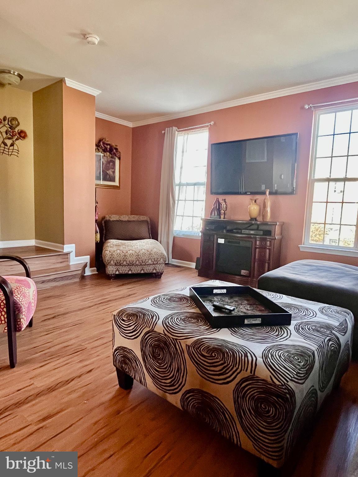 312 Spring Park Lane, Unit 59 Fredericksburg, VA 22405 - Photo 7 of 20 a bedroom with furniture and a window