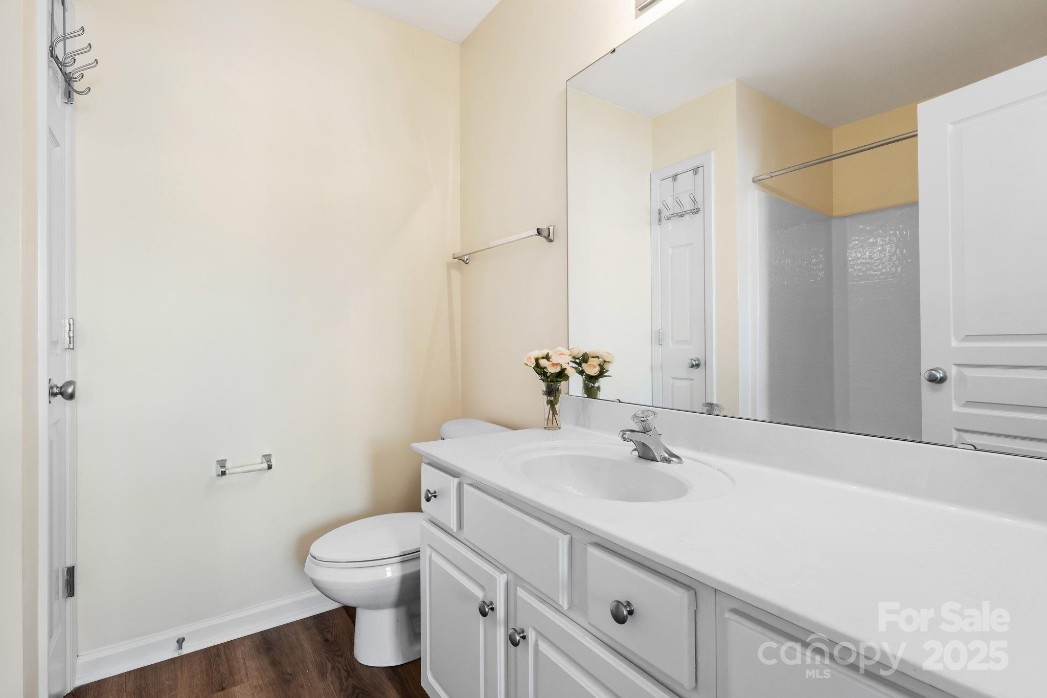 811 Gentlewinds Court Fort Mill, SC 29708 - Photo 21 of 25 a bathroom with a sink toilet and vanity