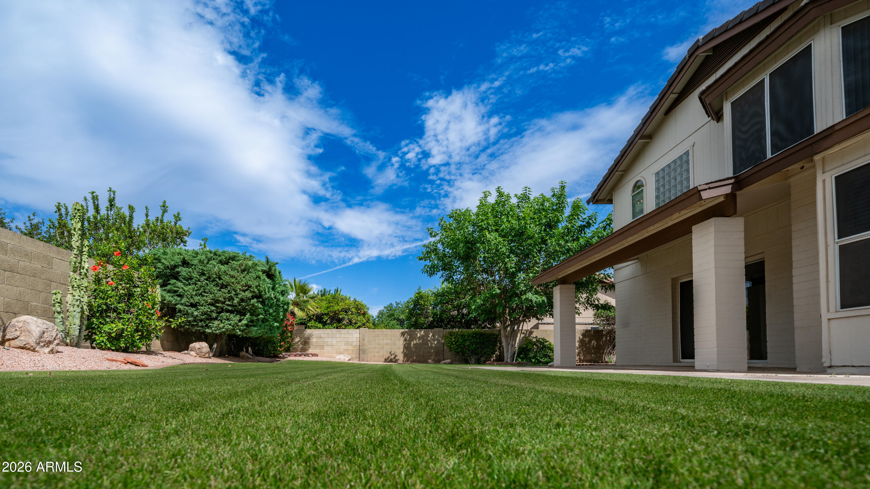 6620 West Redfield Road Glendale, AZ 85306 - Photo 18 of 33 a view of a house with a yard