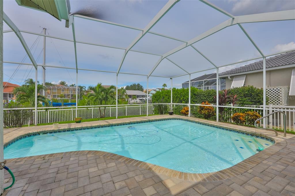 913 Allegro Lane Apollo Beach, FL 33572 - Photo 35 of 57 a view of a backyard with a swimming pool
