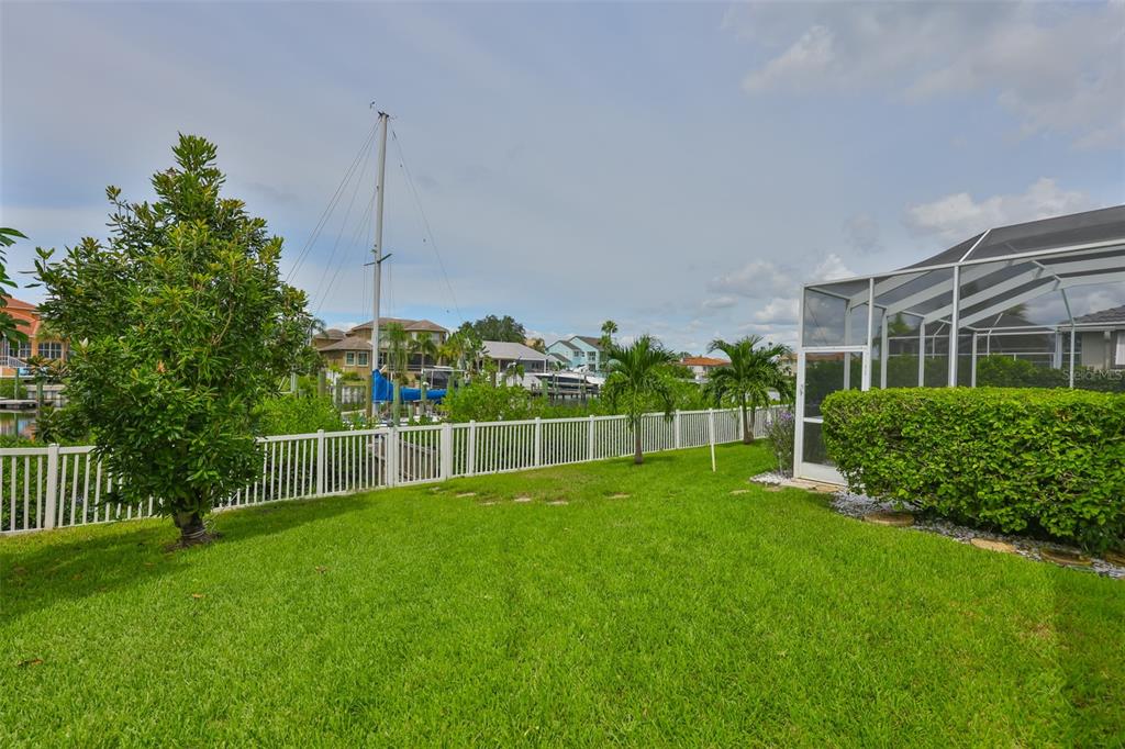 913 Allegro Lane Apollo Beach, FL 33572 - Photo 38 of 57 a view of a backyard with a small cabin