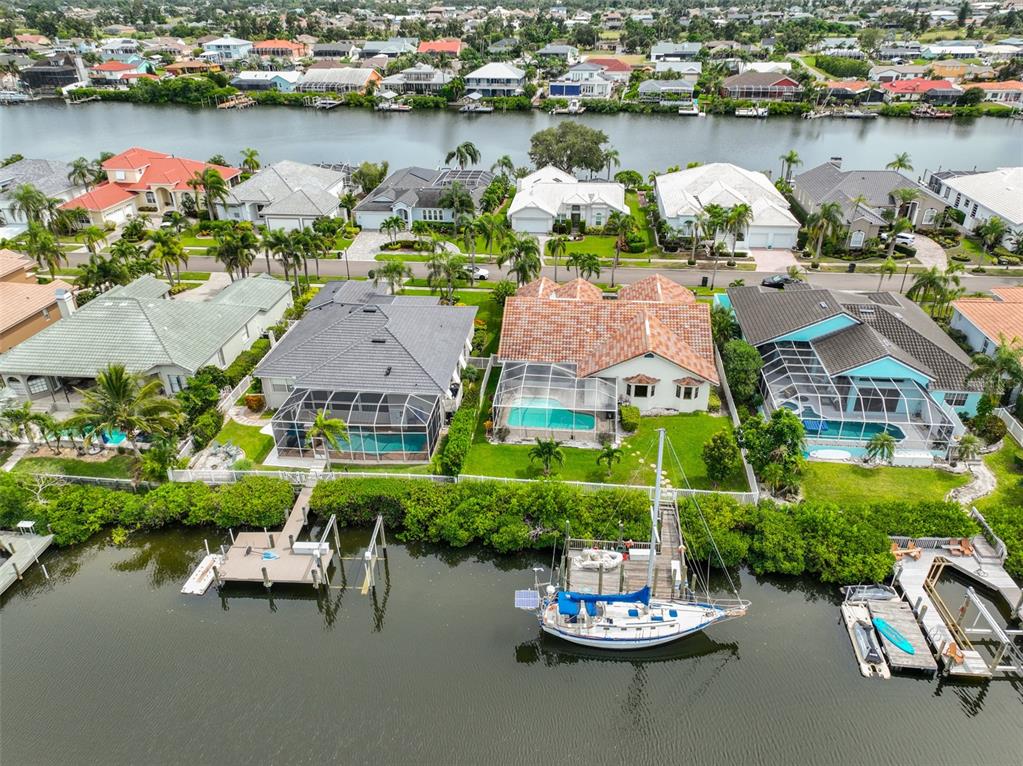 913 Allegro Lane Apollo Beach, FL 33572 - Photo 45 of 57 an aerial view of a house with outdoor space and lake view