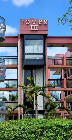 a store with a table and chairs in front of it