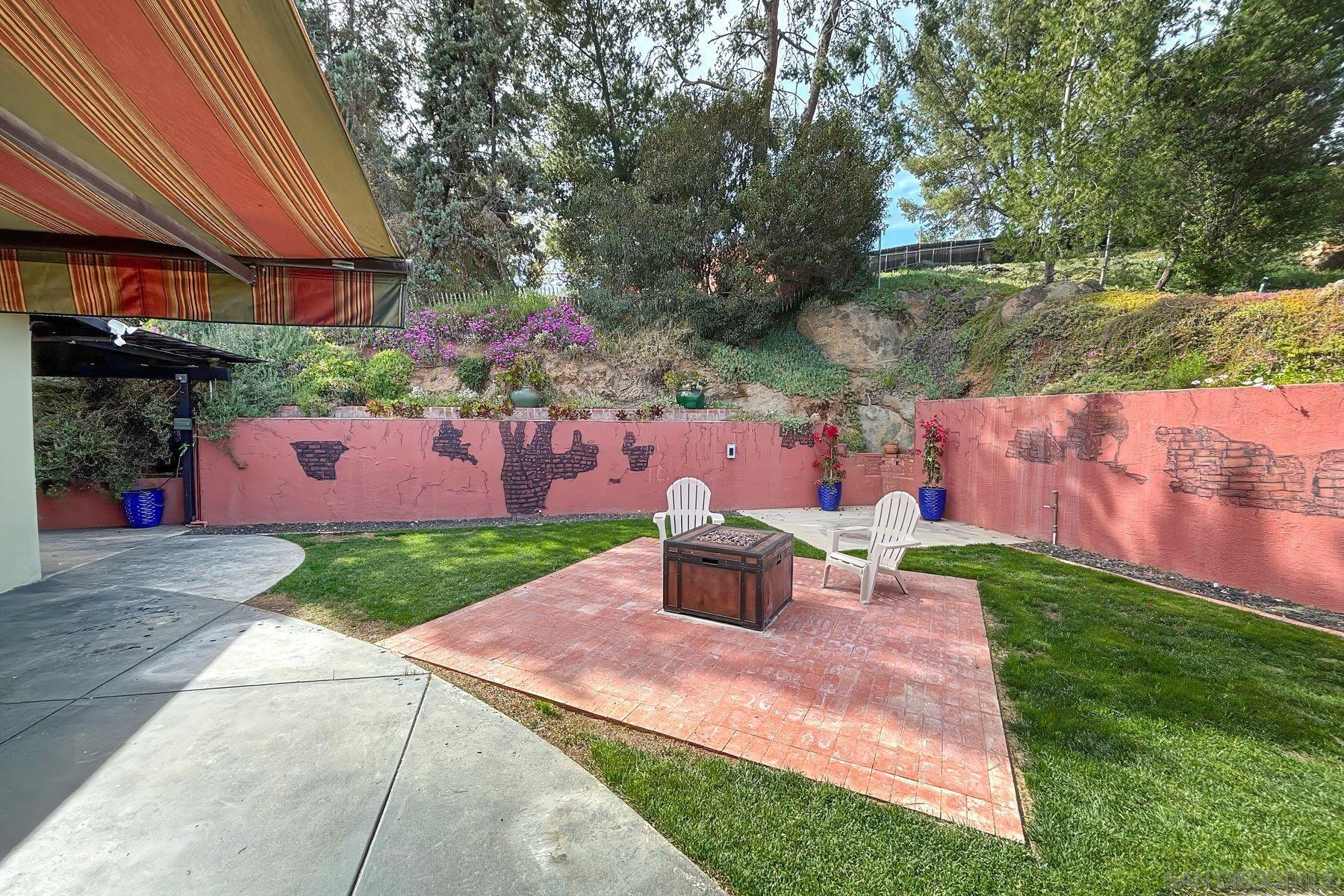 1912 Jalisco Road El Cajon, CA 92019 - Photo 16 of 38 front view of a house with a yard